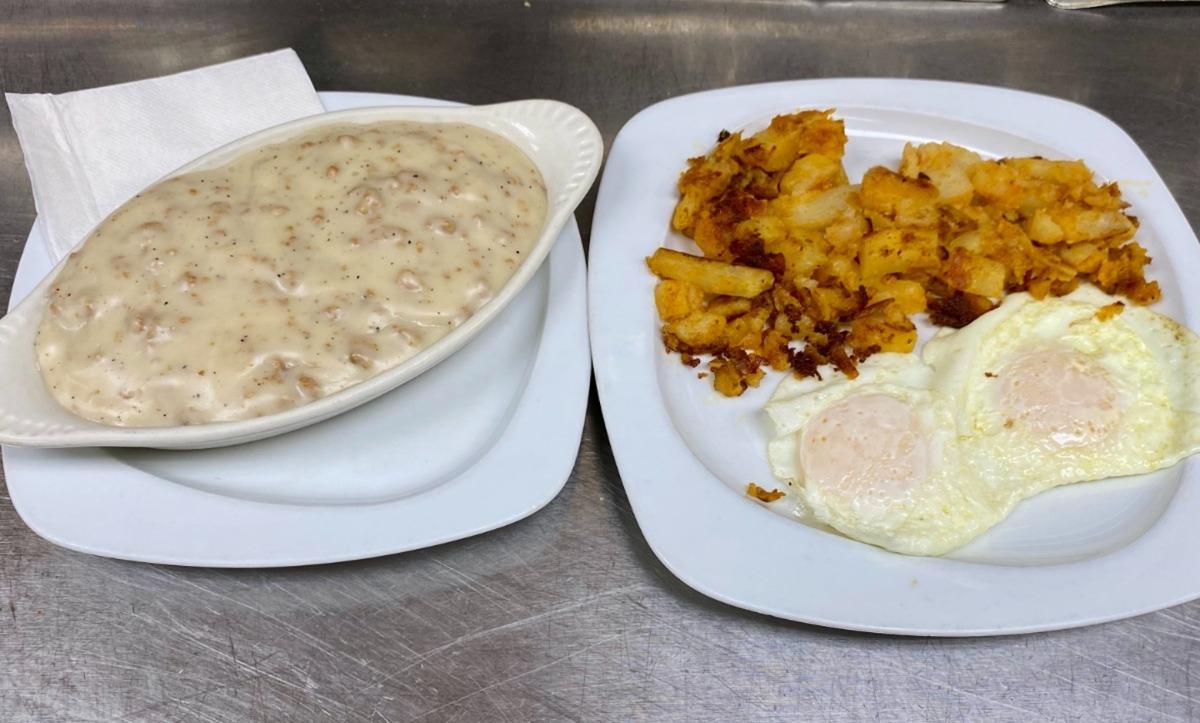 2 Eggs w/ Sausage, Gravy & Biscuits